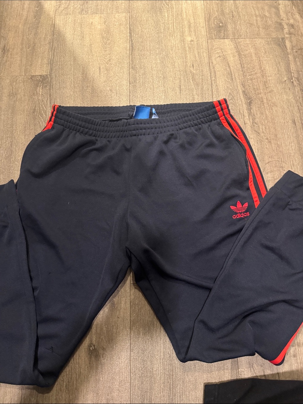 adidas men’s Black Joggers with Red Stripe Detailing